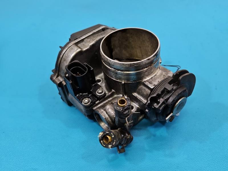Дросельна заслінка Seat Toledo 06A133064M