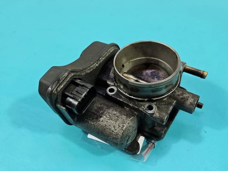 Дросельна заслінка Opel Astra G 09128518