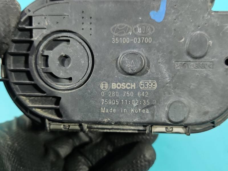 Дросельна заслінка Hyundai I30 35100-03700 — фото деталі 9