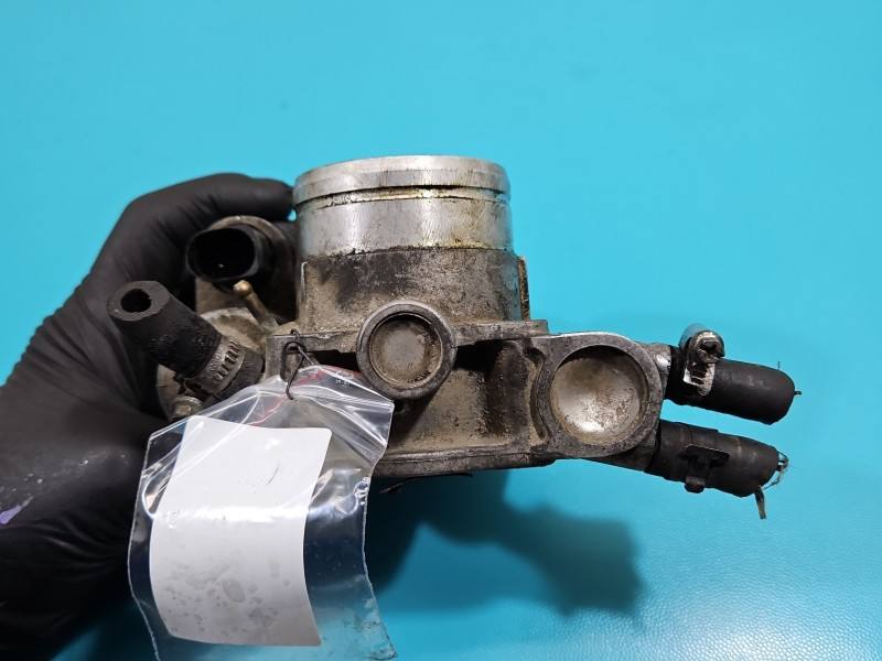 Дроссельная заслонка Volkswagen Passat B5 06B133062P — фото детали 4