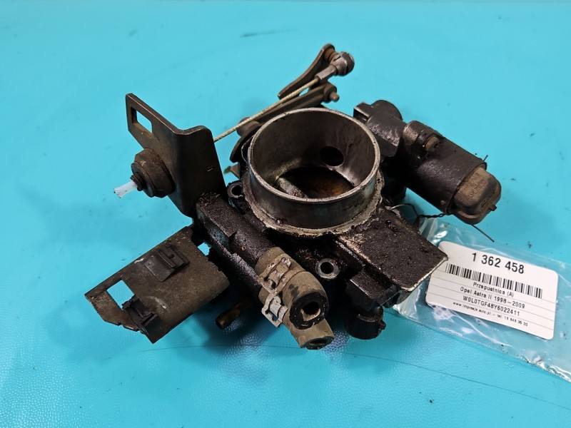 Дросельна заслінка Opel Astra G 90529710