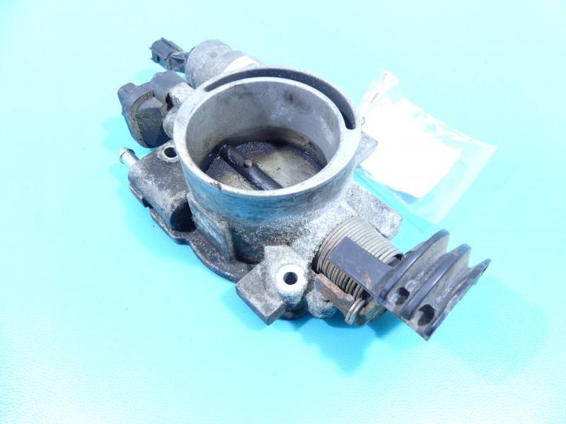 Дросельна заслінка Dodge Caravan 04861256AG