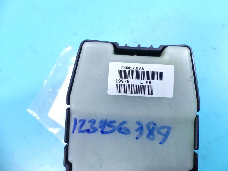 Блок кнопок склопідйомників Chrysler Sebring 04602781AA — фото деталі 5