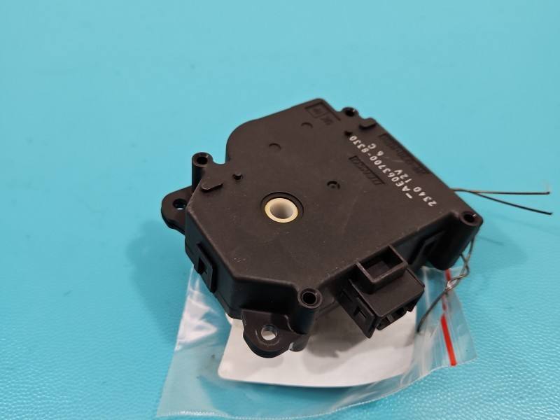 Моторчик заслінки пічки Toyota Camry AE063700-8330