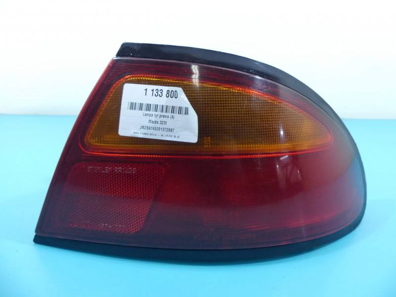 Фонарь задний правый Mazda 323F