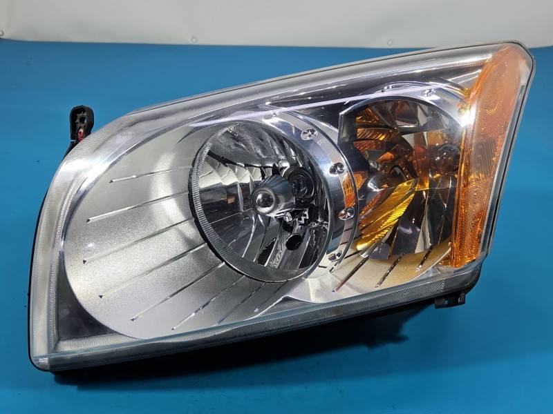 Фара передня ліва Dodge Caliber 05303741AL