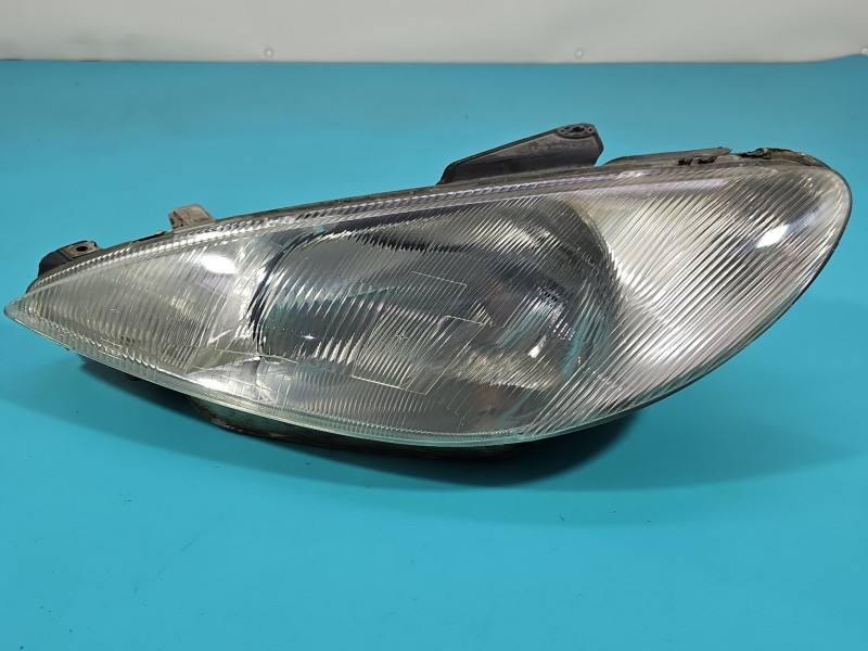 Фара передня ліва Peugeot 206 9640559580