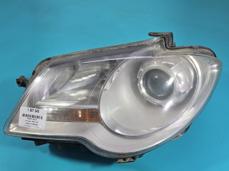 Фара передня ліва Volkswagen Touran 0301233201