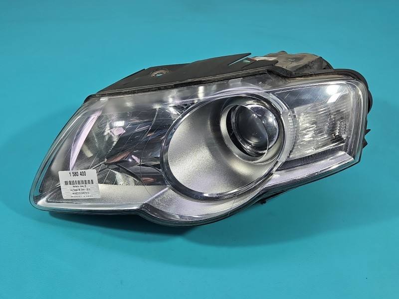 Фара передня ліва Volkswagen Passat B6 1EL247014