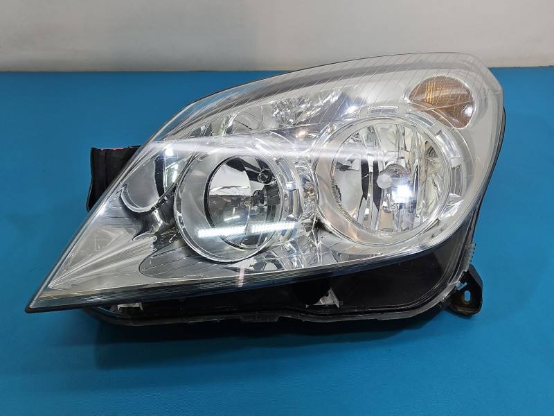 Фара передня ліва Opel Astra H 1EG270370-61