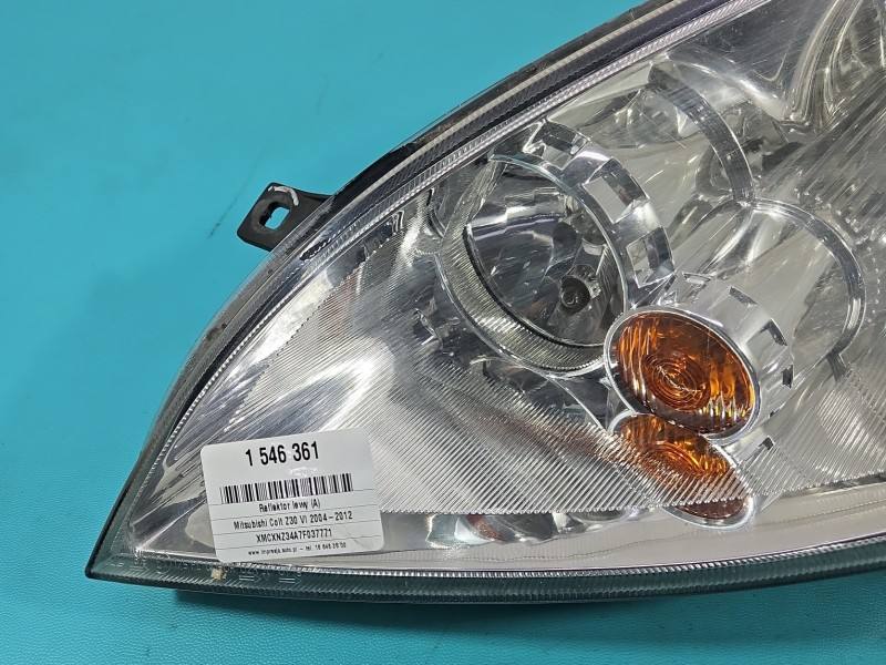 Фара передня ліва Mitsubishi Colt 0301208201 — фото деталі 5