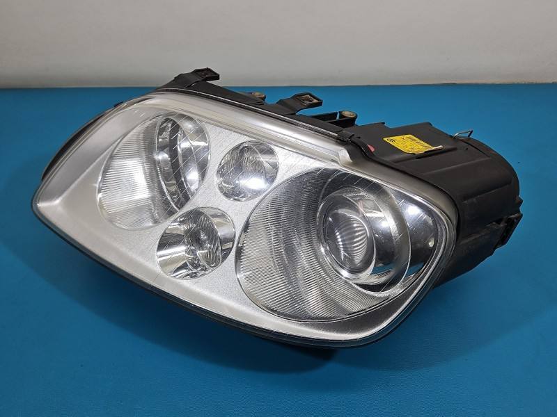 Фара передняя левая Volkswagen Touran 0301205271