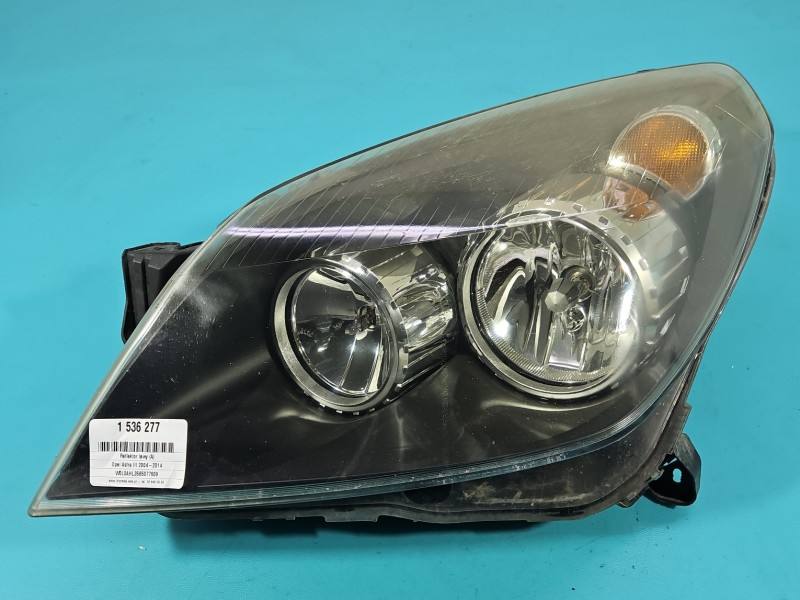 Фара передня ліва Opel Astra H 1EG270370-01