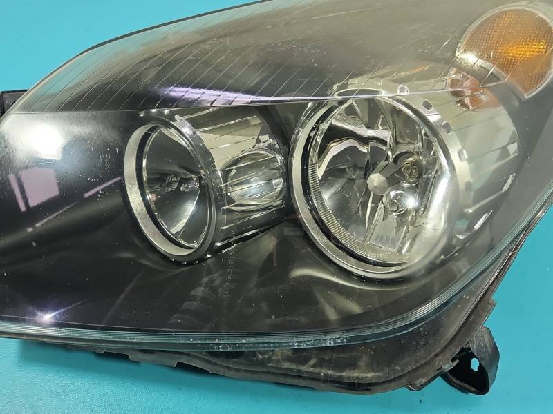 Фара передня ліва Opel Astra H 1EG270370-01 — фото деталі 4