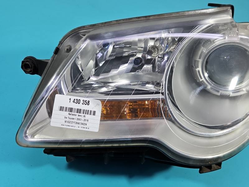 Фара передня ліва Volkswagen Touran 1T0941005B — фото деталі 2
