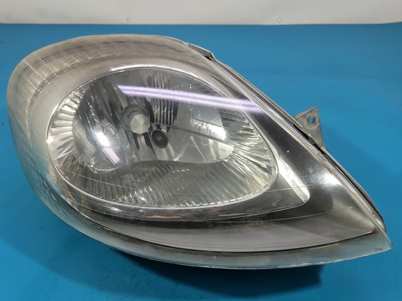 Фара передня права Opel Vivaro 7700311372