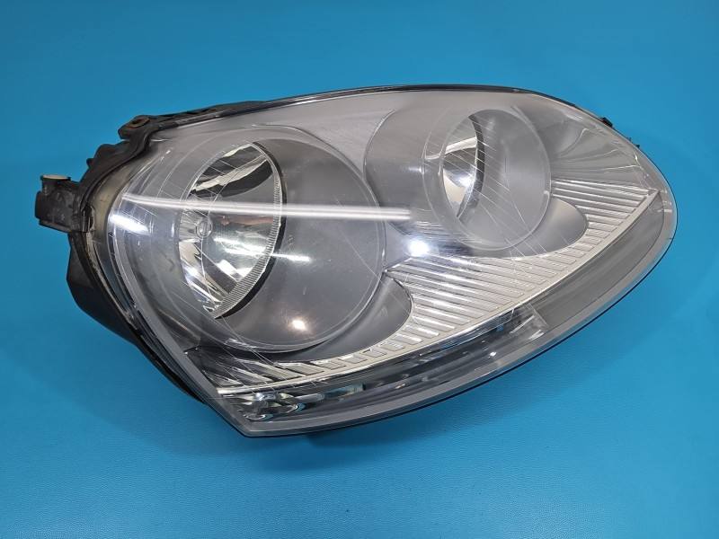 Фара передня права Volkswagen Golf 5 0301212202