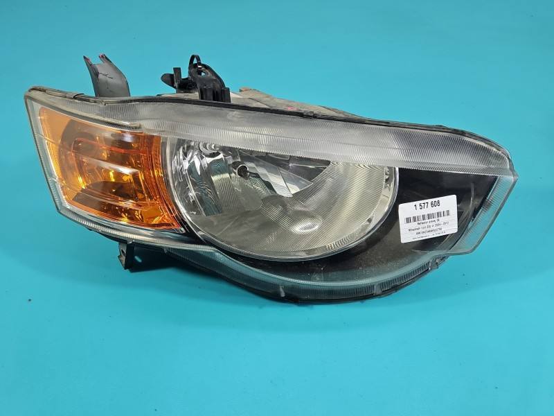 Фара передня права Mitsubishi Colt 030124930200