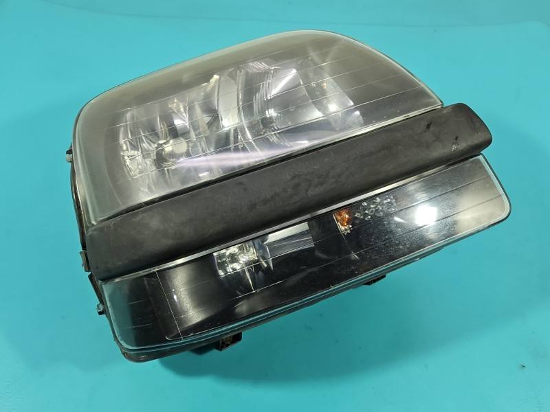 Фара передня права Fiat Doblo 46807769