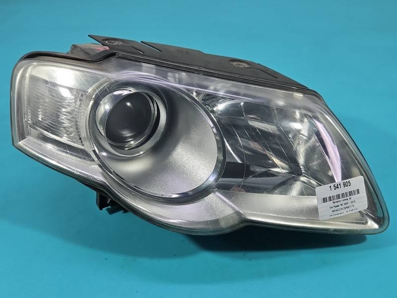 Фара передня права Volkswagen Passat B6 1EL247014-02