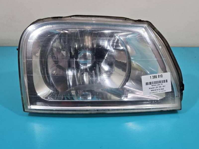 Фара передня права Mitsubishi L200