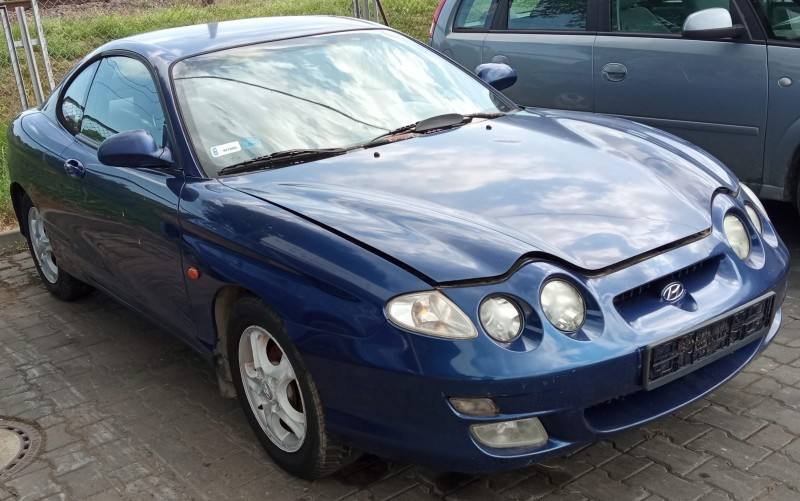 Фара передня права Hyundai Coupe — фото деталі 8
