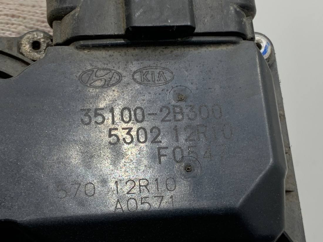 Дросельна заслінка Hyundai Ix35 35100-2B300 — фото деталі 4