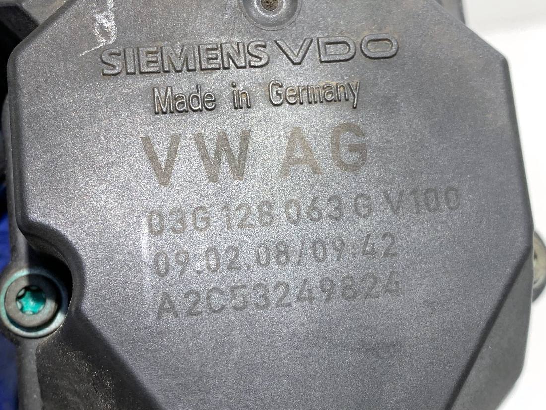 Дроссельная заслонка Volkswagen Golf 5 03G128063G — фото детали 4