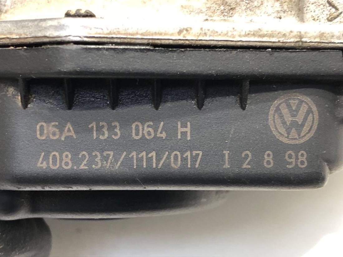 Дроссельная заслонка Volkswagen Bora 06A133064H — фото детали 5