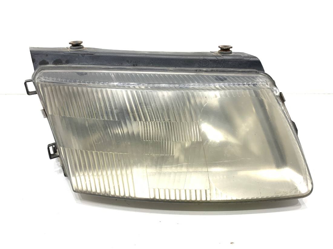 Фара передня права Volkswagen Passat B5 148692-00