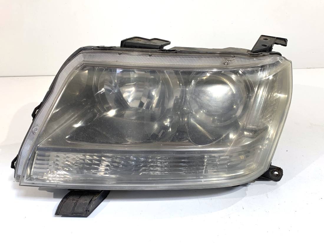 Фара передня ліва Suzuki Grand Vitara 100-59079