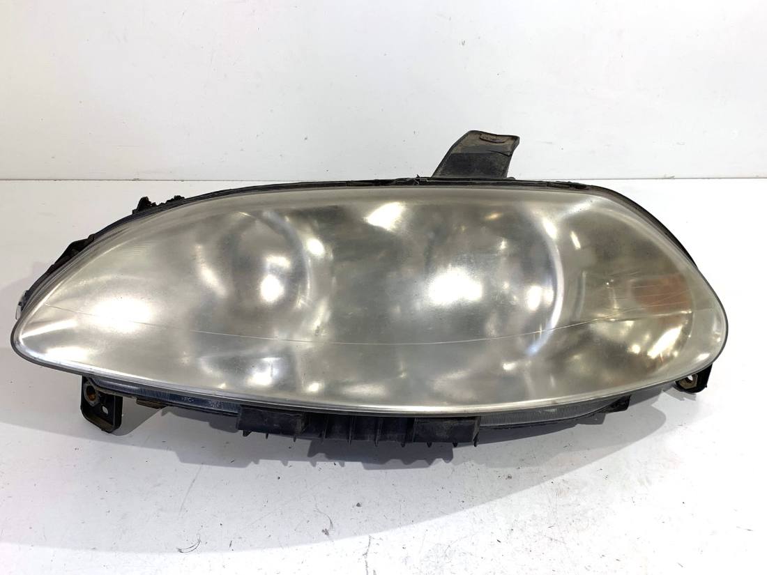 Фара передня ліва Fiat Croma 51733561