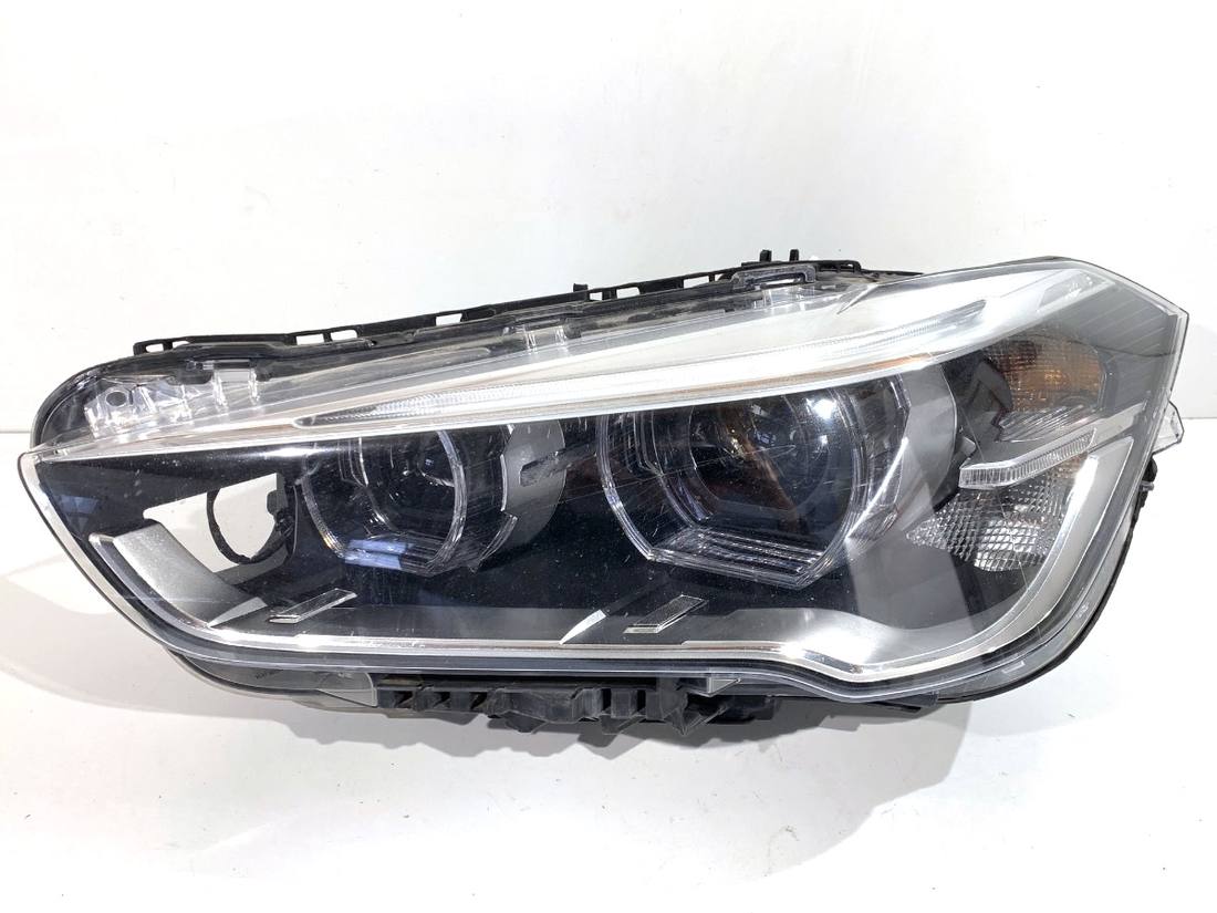 Фара передняя левая BMW X1 E84 7495003